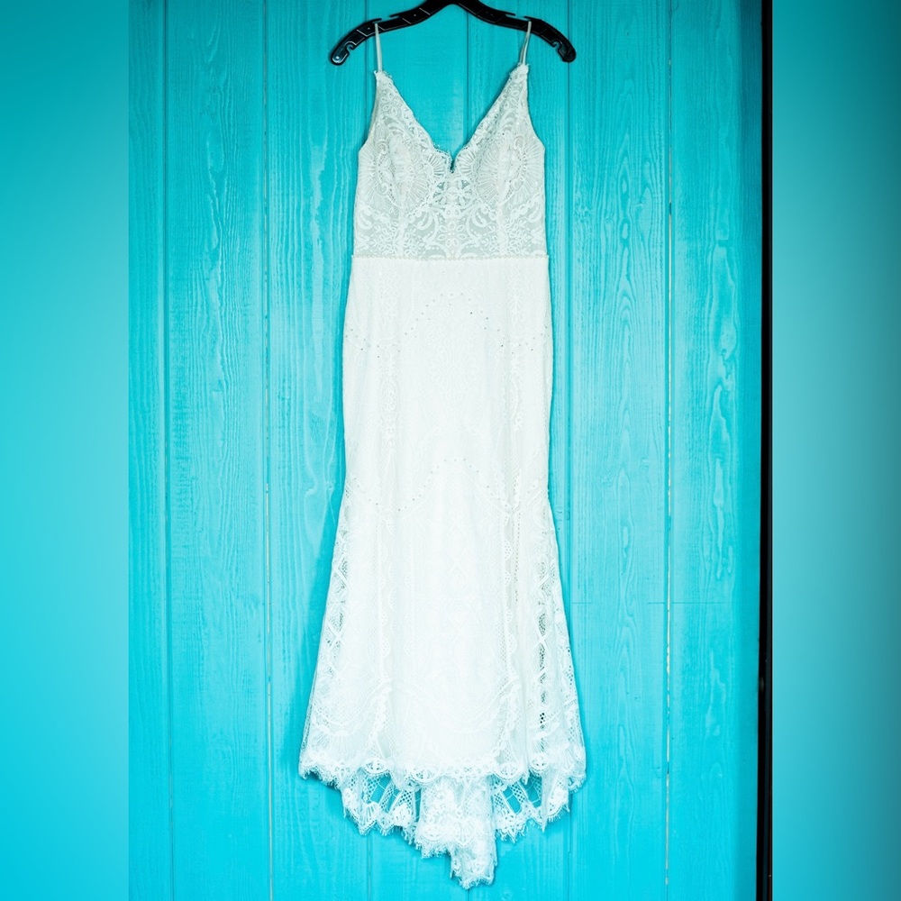 Beautiful fit and flare lace wedding dress by Rish Bridal